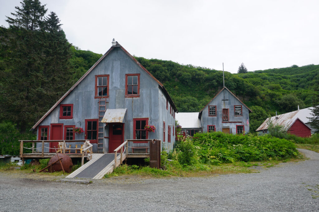 Snug Harbor Outpost, a bear-viewing lodge at a former cannery on Chisik Island, is perched above Tuxedni Channel. Its owners worry about the potential impacts of a mining operation on the area. Credit: Max Graham/Northern Journal