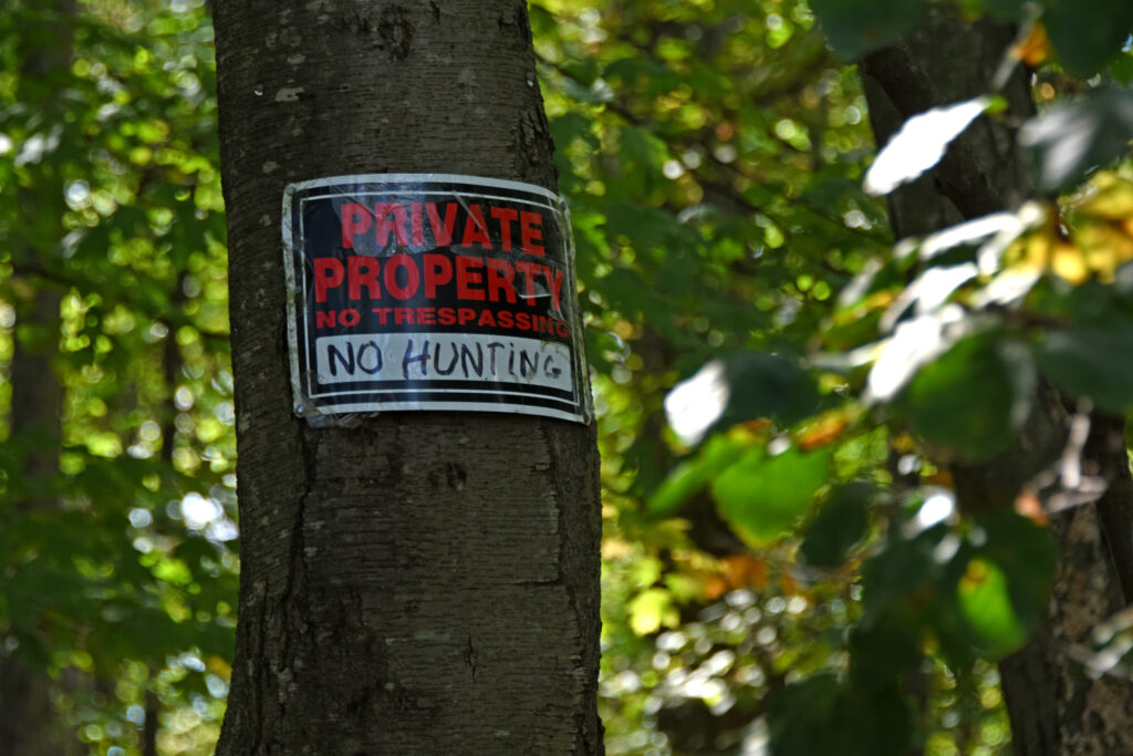 Private property signs line the 120-acre property. Credit: Ryan Krugman/Inside Climate News