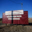 Transmission lines stand above the entrance to the Loring Commerce Centre at the site of the former Loring Air Force Base. Credit: Derek Davis/Portland Portland Press Herald via Getty Images