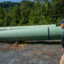 Local resident Bobby Amerson walks past sections of steel pipe to be used for the Mountain Valley Pipeline in Callaway, Va., on Aug. 30, 2022. Credit: Robert Nickelsberg/Getty Images