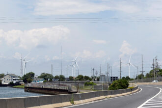 Wind turbines are visible from the highway in Atlantic City, N.J. Credit: Rachel Wisniewski/The Washington Post