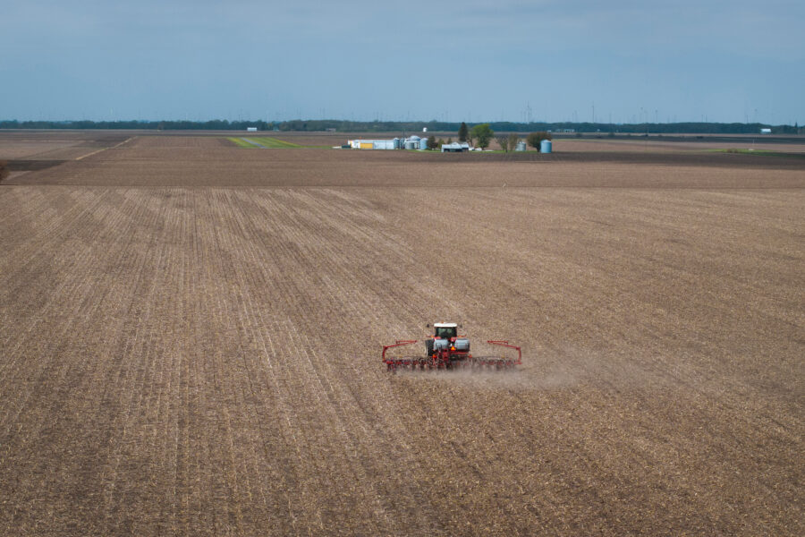 A farmer uses a tractor to plant soybeans on land near Dwight, Ill., on April 28. Credit: Scott Olson/Getty Images