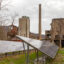 Solar panels stand near the remains of coal mining equipment in Lynch, Ky. Credit: Jim West/UCG/Universal Images Group via Getty Images
