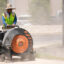 A worker stripes an intersection on a hot afternoon in Austin, Texas, on Aug. 6. Credit: Jay Janner/Austin American-Statesman via Getty Images