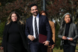 New York City mayor-elect Zohran Mamdani arrives for a news conference alongside members of his mayoral transition team at Flushing Meadows Corona Park in Queens on Wednesday. Credit: Timothy A. Clary/AFP via Getty Images