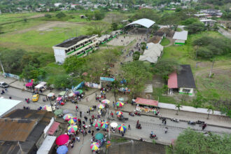 Ecuadoreans gather at a polling center in Manglaralto on Sunday to vote on a referendum proposed by President Daniel Noboa to overhaul Ecuador’s constitution. Credit: Marcos Pin/AFP via Getty Images