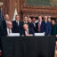 EPA Administrator Lee Zeldin (center) signs a proposed rule in Washington, D.C., on Monday that would revise the definition of “waters of the United States,” scaling back which bodies of water are subject to federal protections. Credit: Aidan Hughes/Inside Climate News