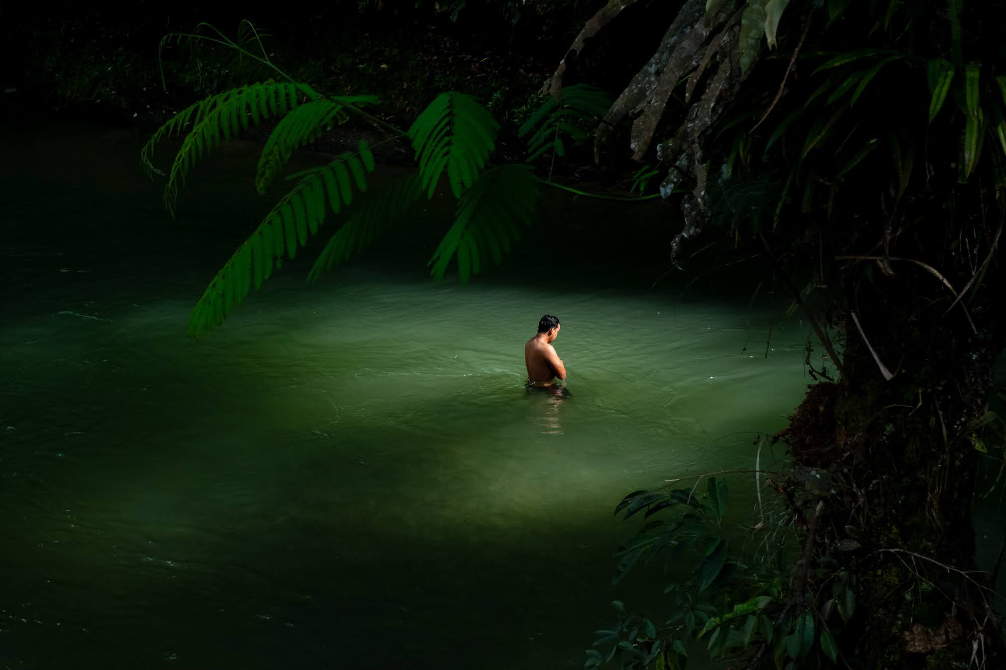 A man bathes in Mocoa’s Caliyacu River.