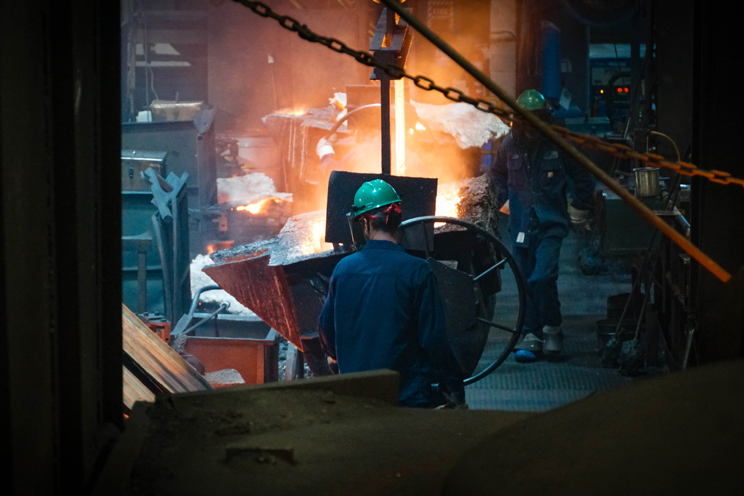 Workers at Metal Technologies wear protective gear around the high heat of the production process. Credit: Metal Technologies