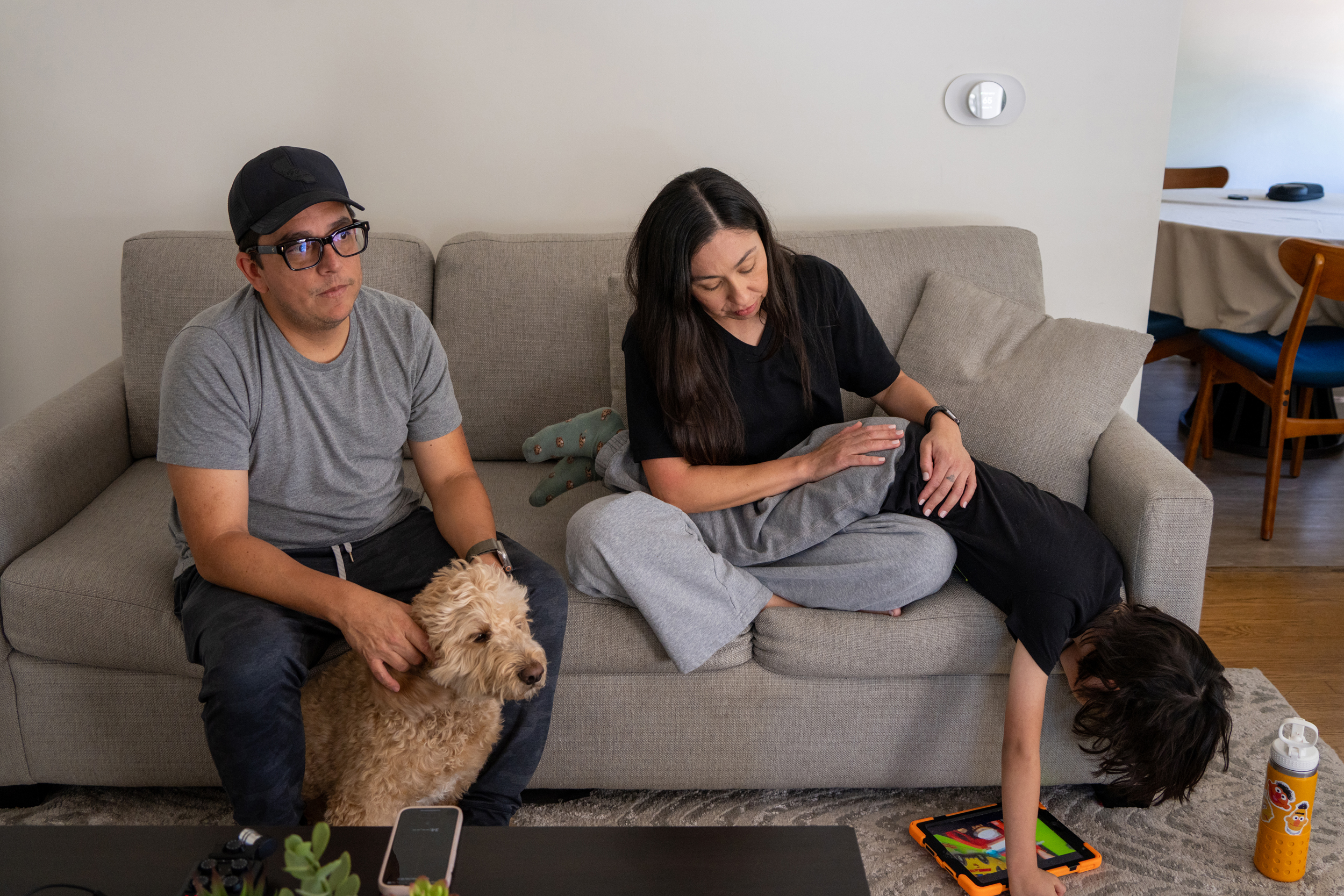 Max goes limp on his mom’s lap as his iPad starts running on low battery.