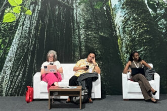 Pictures of trees in the halls of the COP30 venue aren’t helping much with the extreme heat. U.N. officials sent a sharp letter to Brazil, asking the host country to immediately address the concerns. Credit: Bob Berwyn/Inside Climate News