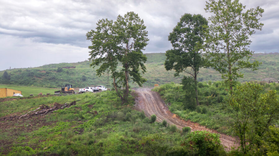 A view of the Westmoreland Sanitary Landfill in Belle Vernon, visible from a strip mall parking lot. Credit: Scott Goldsmith/Inside Climate News