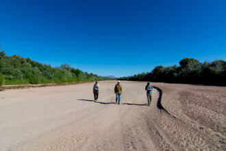 Representatives from Audubon Southwest collect data along the dry Rio Grande at Bosque del Apache National Wildlife Refuge in San Antonio, N.M. Credit: Paul Tashjian