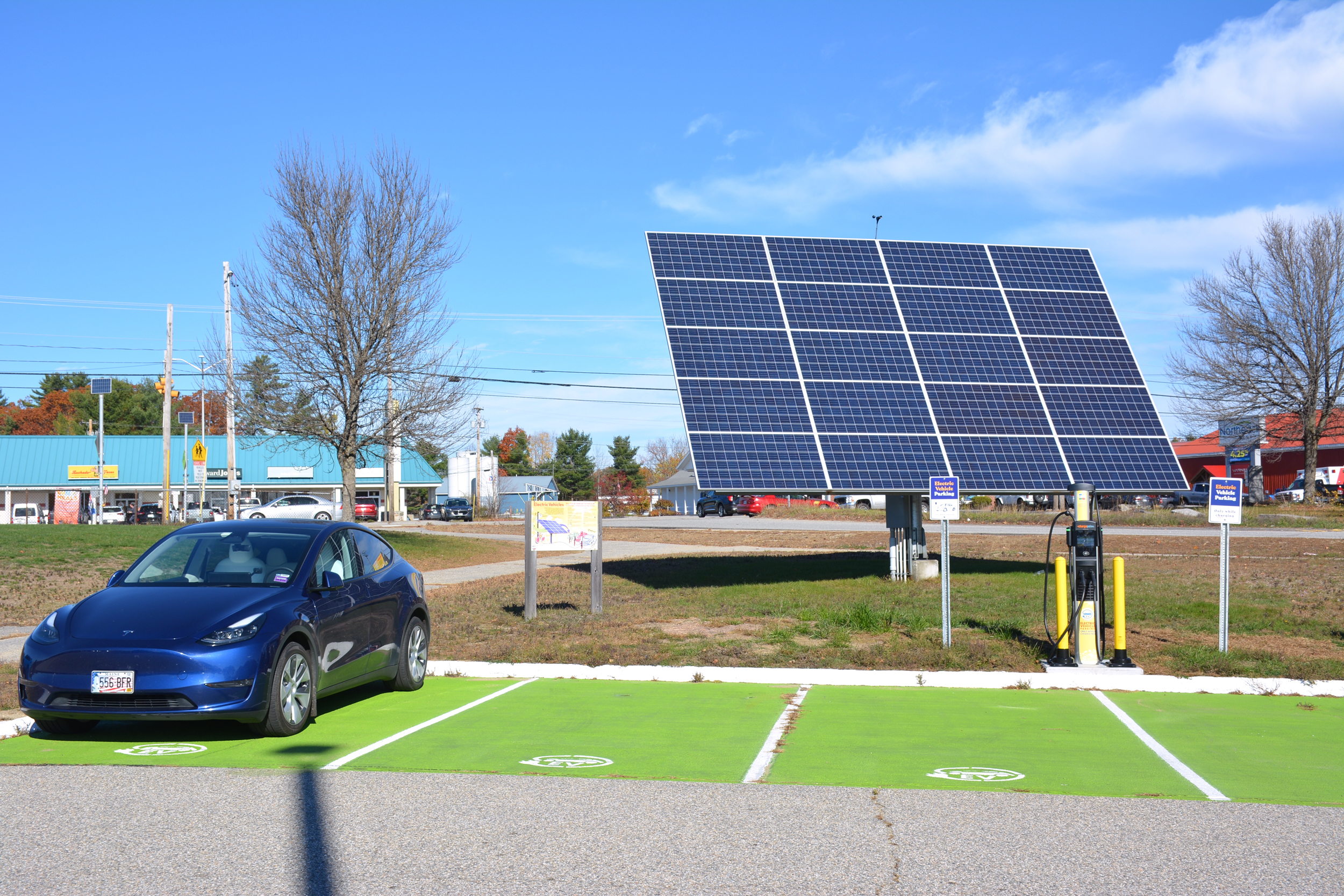 A solar array and EV charger at Oxford Hills Comprehensive High School in Paris, Maine, was installed with help from CEBE. Credit: Sydney Cromwell/Inside Climate News