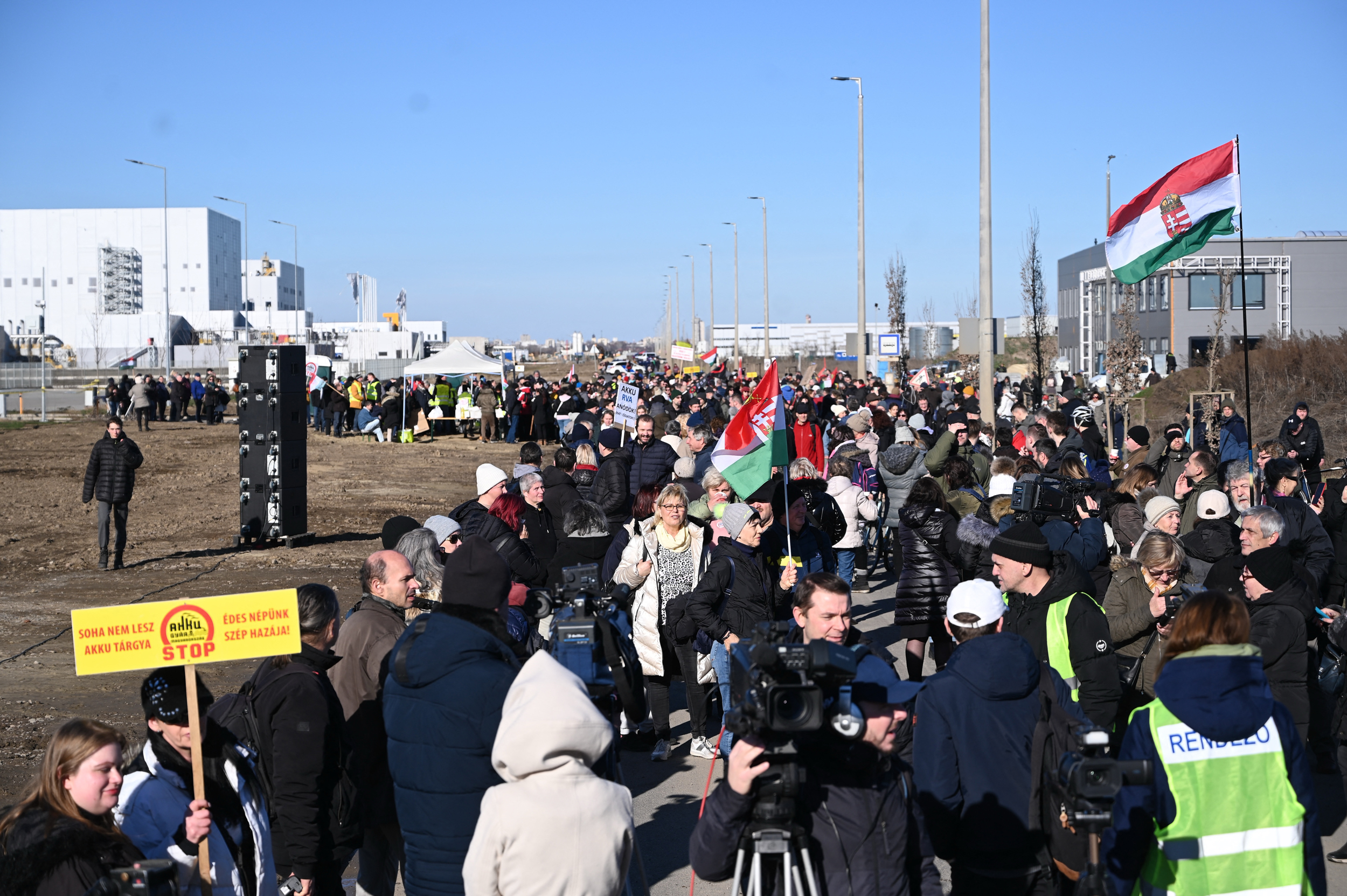 People march to protest against the expansion of the battery industry in Debrecen on Feb. 1. Credit: Attila Kisbenedek/AFP via Getty Images