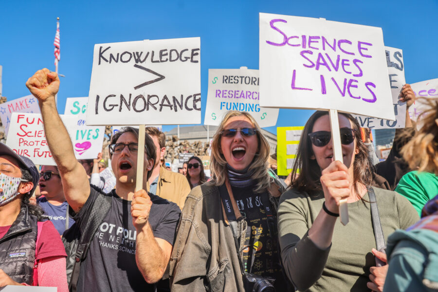 Demonstrators attend a Stand Up for Science rally to highlight the critical role of science in public health, environmental stewardship and education at the Civic Center Plaza in San Francisco on March 7. Credit: Gabrielle Lurie/San Francisco Chronicle via Getty Images