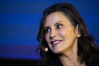 Michigan Gov. Gretchen Whitmer speaks at a Ford Pro Accelerate event on Sept. 3 in Detroit. Credit: Bill Pugliano/Getty Images