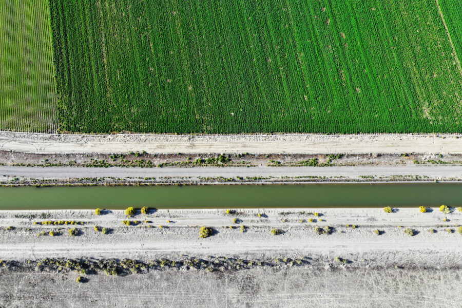 Colorado River water flows through a canal supplying irrigation to farms in Loma, Colo. Credit: RJ Sangosti/MediaNews Group/The Denver Post via Getty Images