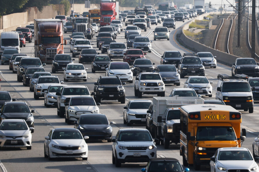 Vehicles move along Interstate 210 on Wednesday in Pasadena, Calif. Credit: Mario Tama/Getty Images