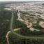 The Interoceanic Highway runs by an illegal gold mining site in La Pampa, Peru. Credit: Ernesto Benavides/AFP via Getty Images