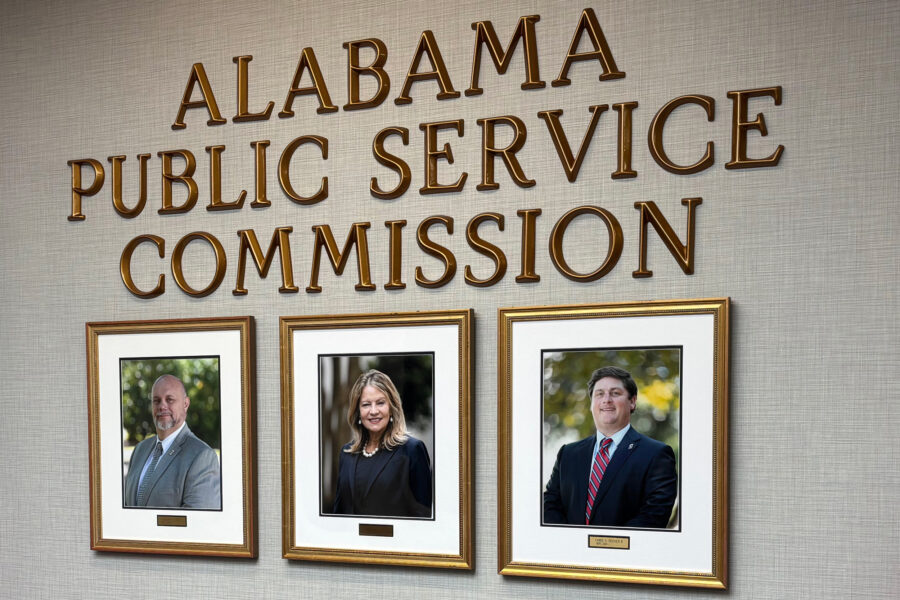 Photos of current Alabama Public Service Commissioners hang in the PSC offices. Chris Beeker (right) lost his reelection bid against Republican opponent Jim Zeigler. Credit: Dennis Pillion/Inside Climate News
