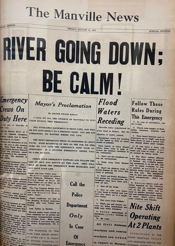 The front page of the Manville News hangs in Richard Onderko’s office. Credit: Emilie Lounsberry/Inside Climate News