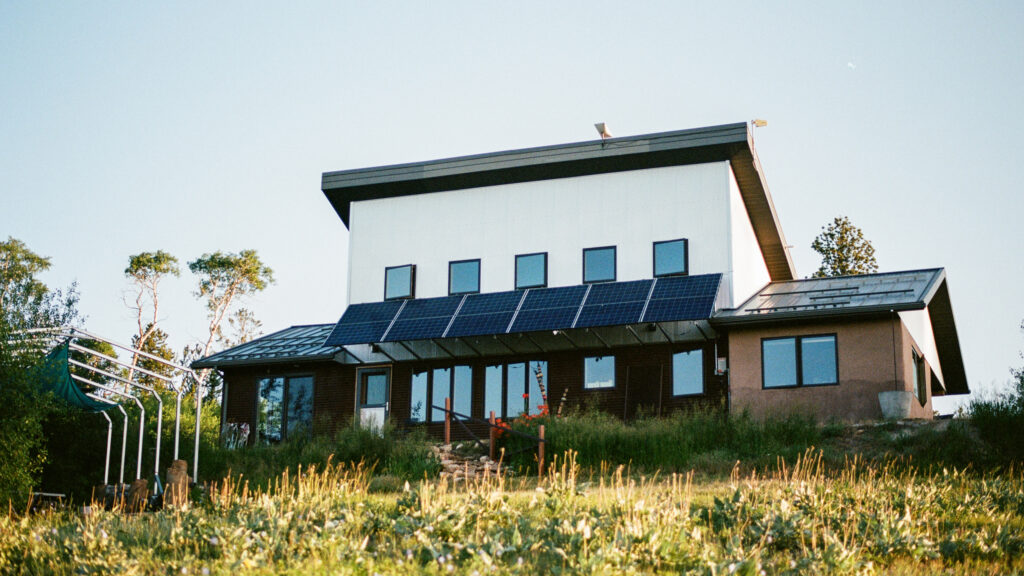 Gary Berchenbriter rebuilt his house next to the old foundation after the Sheepherder Hill fire in 2012. Credit: Jake Bolster/Inside Climate News