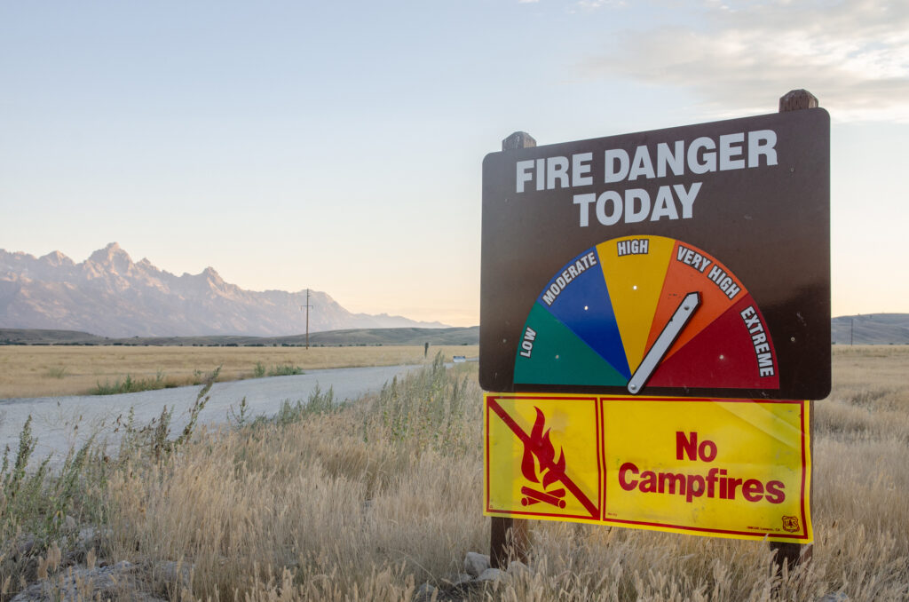 Fire bans were in place across public lands in Teton county by early August 2025. Credit: Jake Bolster/Inside Climate News