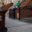 A compost bin sits outside a building in Queens, New York City. Credit: Jake Bolster/Inside Climate News