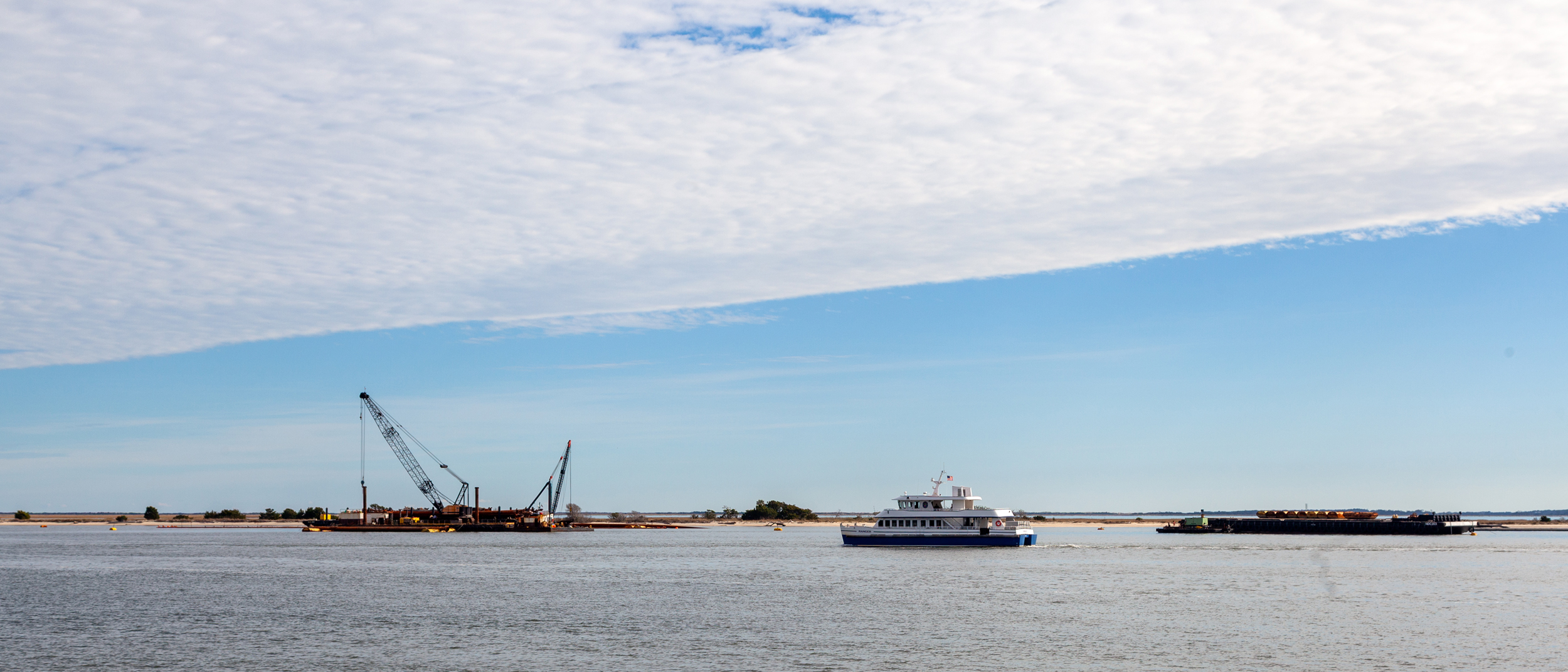 Across the Cape Fear River and the Southport pier lies Battery Island, North Carolina's largest colony for herons, ibis and egrets. Credit: Lisa Sorg/Inside Climate News