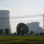 The cooling towers and main unit of the Chinese–funded Sahiwal coal plant dominate the skyline above rural farmlands in Punjab, Pakistan. Credit: Aman Azhar/Inside Climate News
