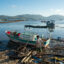 At Xuan Dao Bay, in Vietnam, fishing boats lie destroyed in November 2025 along the shore after being swept away by Typhoon Kalmaegi. leaving many without work. Credit: Magdalena Chodownik/Anadolu via Getty Images