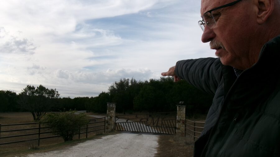 Somervell County Commissioner Jeff Harris shows where a route for a high-voltage transmission line is proposed near Dinosaur Valley State Park. Credit: Arcelia Martin/Inside Climate News