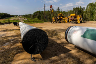 Sections of the Enbridge Line 3 pipeline are seen at a construction site in Park Rapids, Minn., in 2021. Credit: Kerem Yucel/AFP via Getty Images