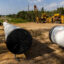 Sections of the Enbridge Line 3 pipeline are seen at a construction site in Park Rapids, Minn., in 2021. Credit: Kerem Yucel/AFP via Getty Images
