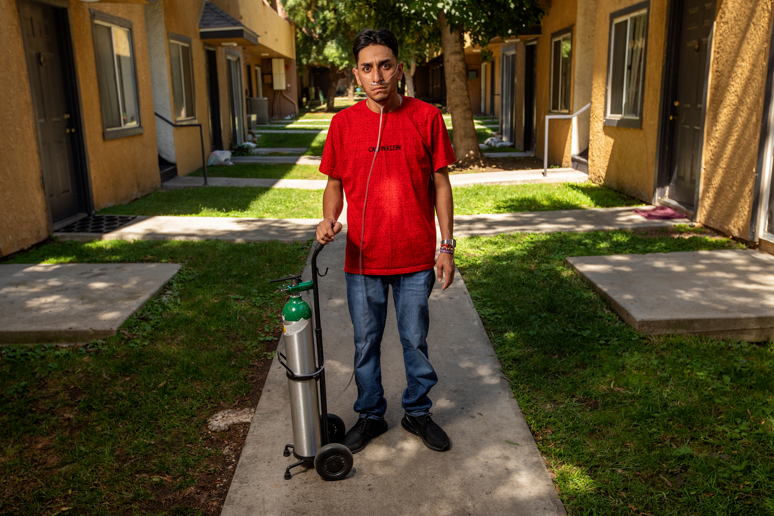 Leobardo Segura Meza, a 27-year-old suffering from silicosis, stands outside of his apartment in Pacoima, Calif., on Sept. 8, 2023. Credit: Mel Melcon/Los Angeles Times via Getty Images