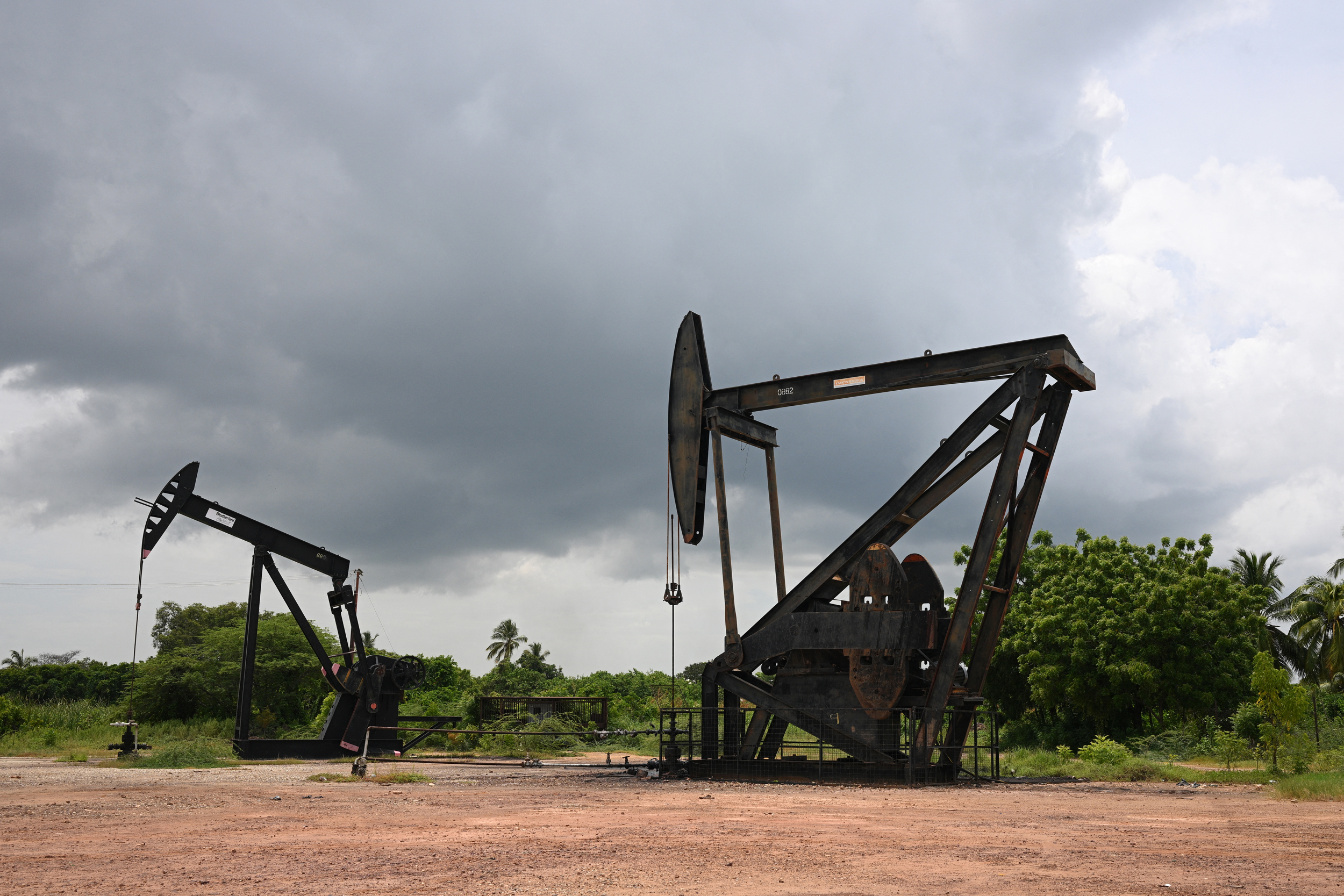Oil pumps are seen in Maracaibo, Venezuela. Credit: Federico Parra/AFP via Getty Images