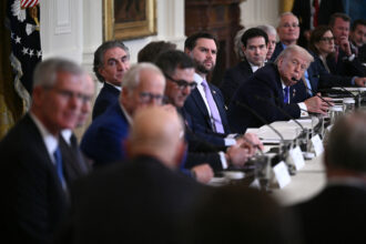 President Donald Trump, flanked by Secretary of State Marco Rubio and Vice President JD Vance, meets with U.S. oil company executives in the at the White House on Friday. Credit: Brendan Smialowski/AFP via Getty Images