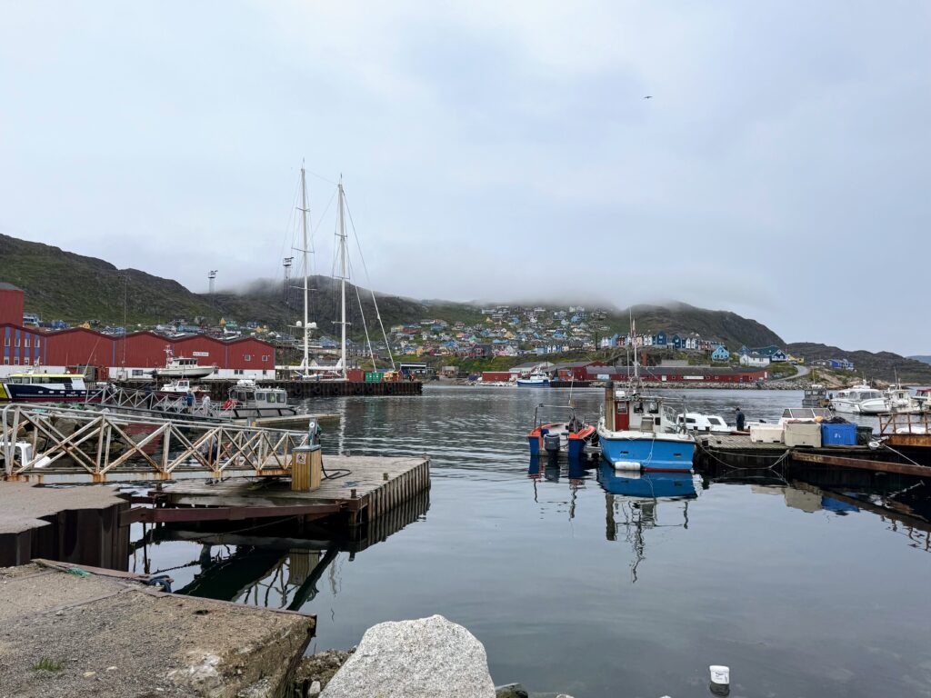 In Qaqortoq Harbor, small-scale fishing remains central to southern Greenland's economy, acting as the link between isolated coastal communities and global supply chains. Credit: Johnny Sturgeon/Inside Climate News