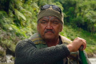 Ned Tapa, a Māori leader, paddles down the Whanganui River in New Zealand. Credit: Richard Sidey