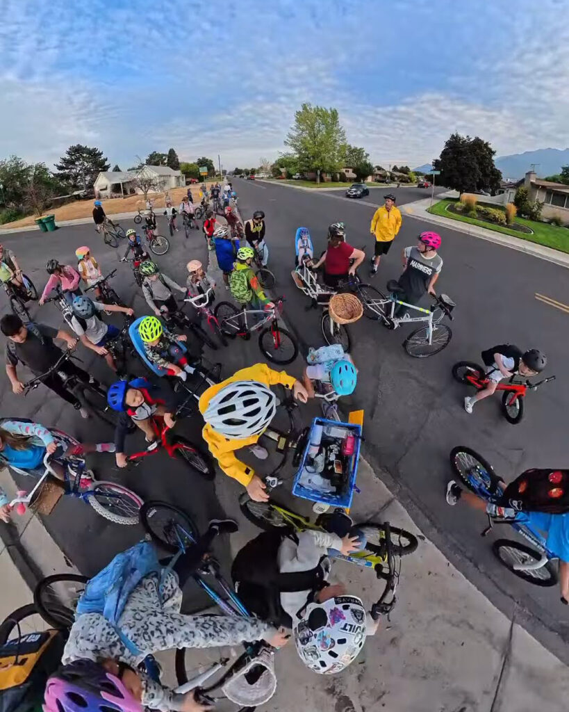 The bike bus to Cascade Elementary School in Orem, Utah, has grown to around 70 children since it began in 2023. Credit: Zach Goulding