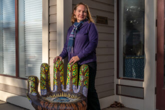 When her son died suddenly, Stephanie Burris of Colorado chose to have his body turned into compost that she scattered around a tree in their yard, houseplants, their favorite trails and family burial plots. Credit: Michael Kodas/Inside Climate News