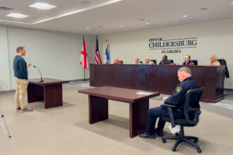 Resident Noah Beckham tells Childersburg's mayor and city council he's skeptical of allowing data centers in the town. Credit: Lee Hedgepeth/ Inside Climate News