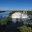 A grain elevator is surrounded by floodwater from the Mississippi River on the Iowa-Illinois border in 2023. Credit: Scott Olson/Getty Images