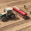 Farmers use a self-driving tractor to sow wheat on a farm in Zhangye, China. Credit: CFOTO/Future Publishing via Getty Images