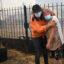 A Civil Protection member comforts a woman as a wildfire burns in the village of Veiga das Meas, Spain, on Aug. 16, 2025. Increasingly severe wildfire seasons around the world are one of the signs that some forests are at a climate threshold. Credit: Miguel Riopa/AFP via Getty Images