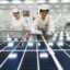 Employees work on photovoltaic cell modules used in solar panels at a factory in Lianyungang, China. Credit: AFP via Getty Images