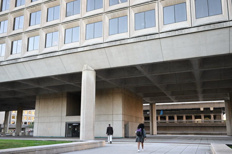 Employees walk into the U.S. Department of Energy building in Washington, D.C. Credit: Andrew Caballero-Reynolds/AFP via Getty Images