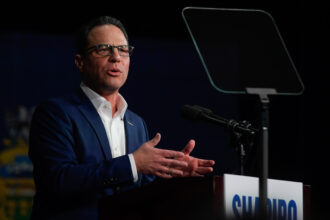 Pennsylvania Gov. Josh Shapiro speaks to supporters at a rally announcing his reelection bid on Jan. 8 in Philadelphia. Credit: Matthew Hatcher/Getty Images