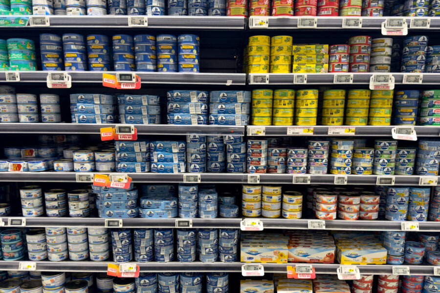 Cans of tuna, sardines, and other canned fish are displayed on a supermarket shelf in southwestern France on Jan. 16. Credit: Véronique Tournier/Hans Lucas/AFP via Getty Images